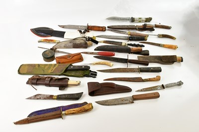 Lot 1343 - A collection of knives including Bowie knives,...