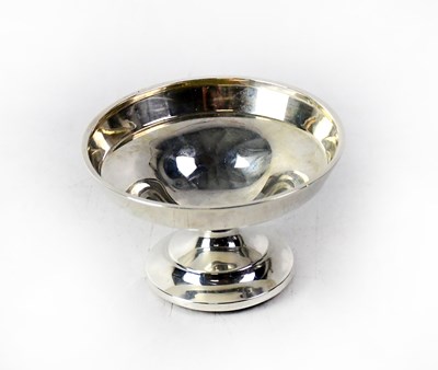 Lot 656 - A white metal bowl to circular stepped base,...