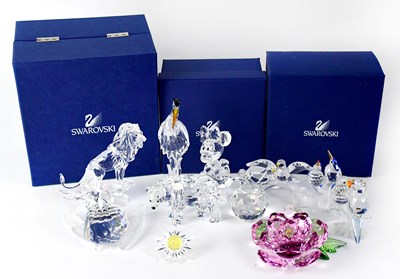 Lot 352 - SWAROVSKI; twelve crystal figures of varying...
