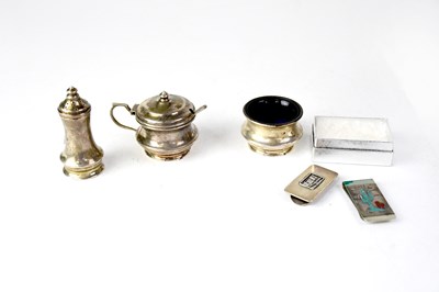 Lot 694 - A hallmarked silver three-piece cruet set...