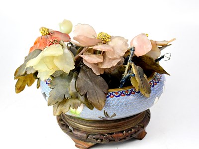 Lot 128 - A jade and agate floral display, a pale blue...