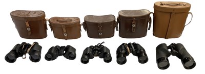 Lot 307 - Five pairs of cased binoculars including a...