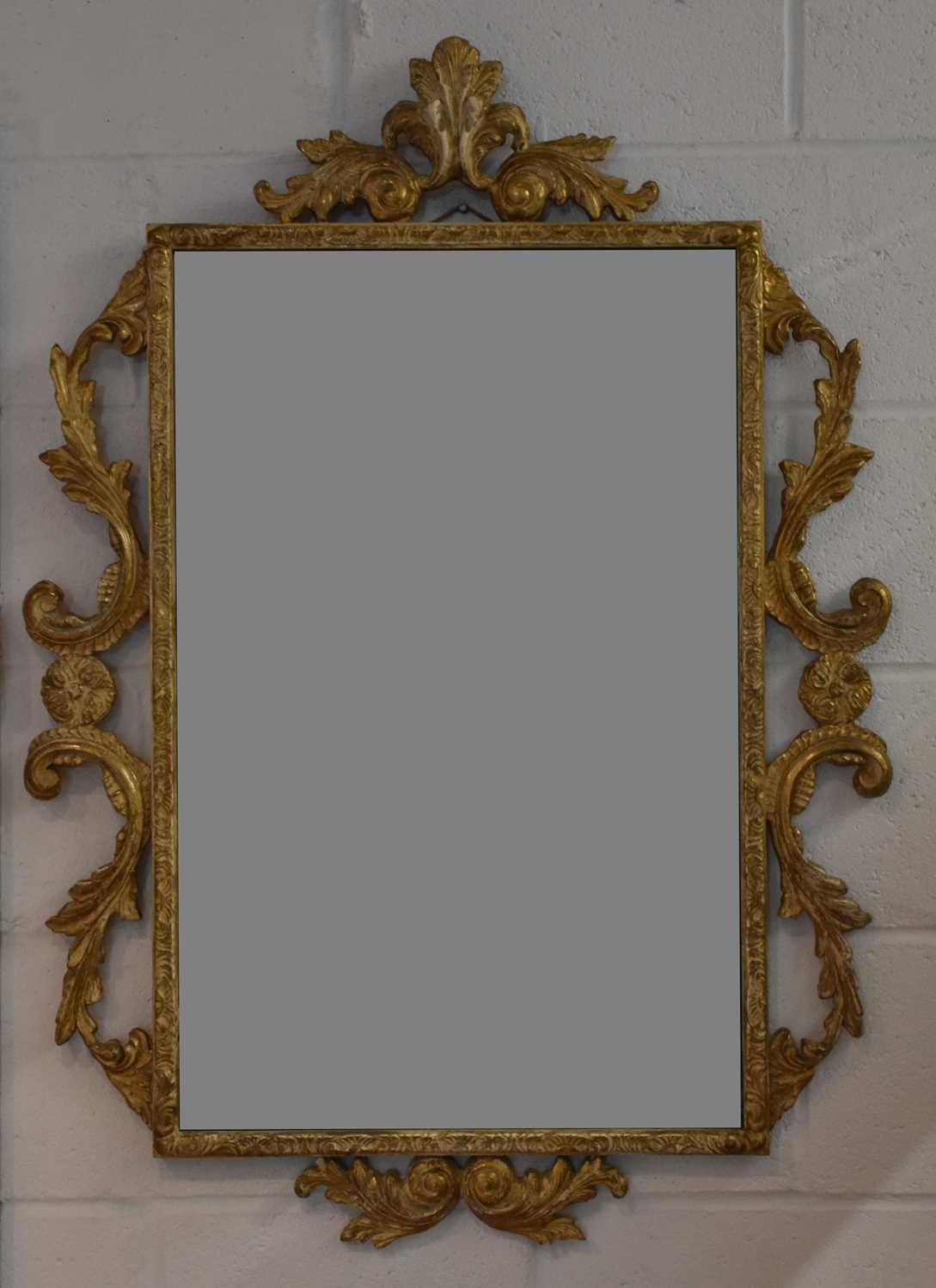 Lot 29 - A modern elaborately gilt framed rectangular...
