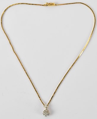 Lot 721 - An 18ct yellow gold diamond pendant set with...