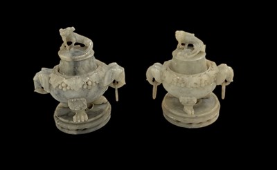 Lot 562 - A pair of Chinese carved hardstone twin...