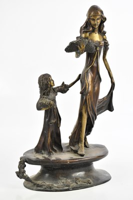 Lot 2683 - An Art Nouveau bronze figure of mother and...