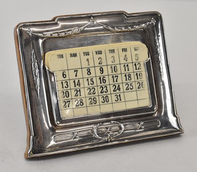 Lot 689 - A George V hallmarked silver fronted desk...