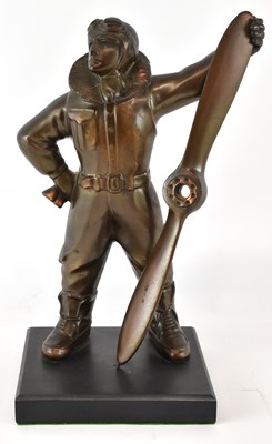 Lot 300 - A novelty bronzed copper table lighter...