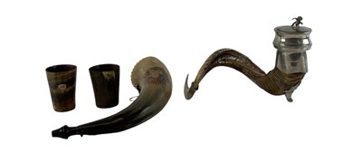 Lot 330 - Two horn powder flasks and two horn beakers...