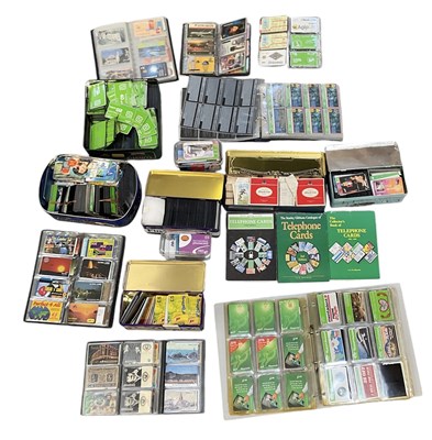 Lot 316 - A large collection of phone cards, contained...