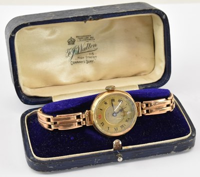 Lot 926 - A lady's vintage 9ct gold wristwatch, the dial...