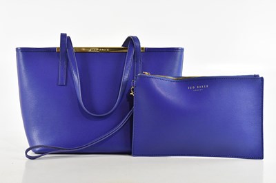 Lot 2059 - TED BAKER; a textured electric blue leather...