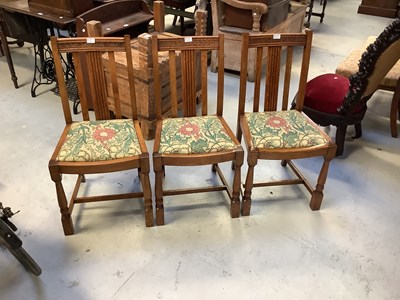 Lot 24 - A Victorian oak wind-out dining table, with...