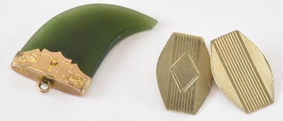 Lot 864 - A vintage Chinese green jade tiger claw, with...