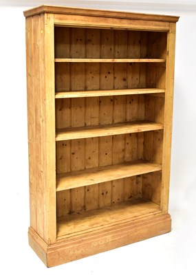 Lot 115 - A large modern rustic pine bookcase with four...