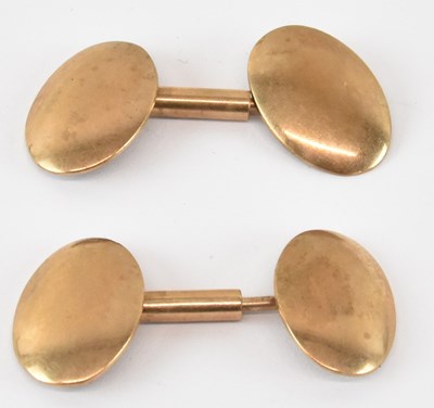 Lot 803 - A pair of 9ct gold cufflinks with adjustable...