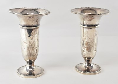 Lot 667 - A pair of George V hallmarked silver vases,...