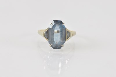 Lot 871 - A 9ct gold blue stone set dress ring, size I,...
