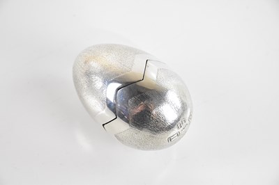 Lot 51 - BRUCE RUSSELL, GUERNSEY; a silver novelty egg,...