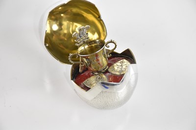 Lot 51 - BRUCE RUSSELL, GUERNSEY; a silver novelty egg,...