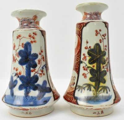Lot 581 - Two 19th century Imari vases of bell form,...