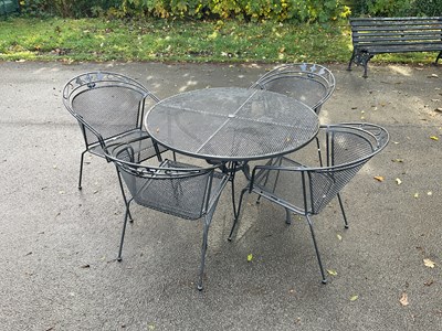 Lot 293 - A green painted metal garden table, height...