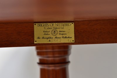 Lot 53 - A Georgian-style circular dining table, cross...