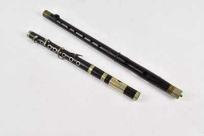 Lot 1598 - G H HULLER; an ebonised piccolo, with further...