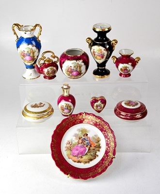 Lot 408 - LIMOGES; a small quantity of gilt-heightened...