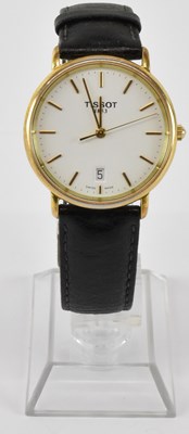 Lot 940 - TISSOT; a gentleman's gold plated quartz...