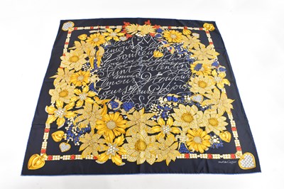 Lot 1914 - MUST DE CARTIER; a 100% silk Sciarpa navy blue,...