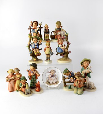 Lot 435 - GOEBEL; twelve figures and a pin dish (13).