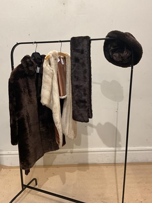 Lot 748 - TESCAN; a short brown fur coat with collar,...