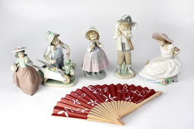 Lot 447 - NAO; five figurines, two boxed, and a fan (6).
