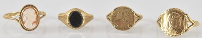 Lot 801 - Four 9ct gold rings comprising a cameo example,...