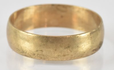 Lot 867 - A 9ct gold band ring, size T, approx 2.8g.