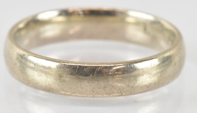 Lot 868 - A 9ct white gold band ring, size N, approx 3g.