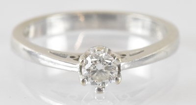Lot 816 - A 9ct white gold diamond solitaire ring, the...