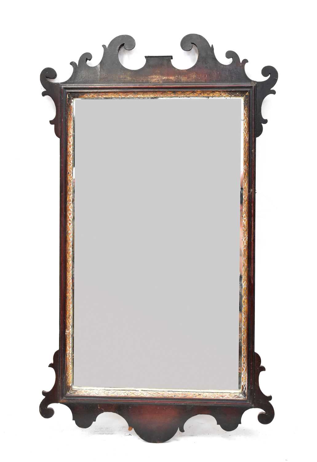 Lot 109 - A Georgian mahogany fret carved mirror with...