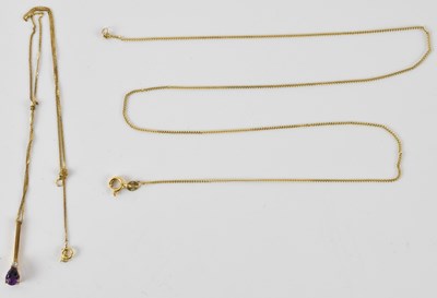 Lot 797 - A 9ct gold pendant with pear shaped claw set...