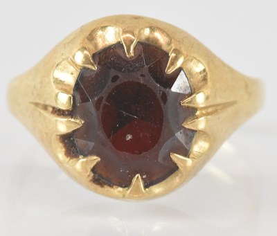 Lot 851 - A vintage 9ct gold claw set garnet signet ring,...