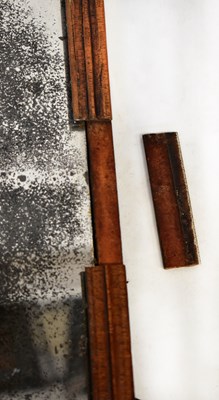 Lot 107 - A Georgian walnut framed fret carved wall...