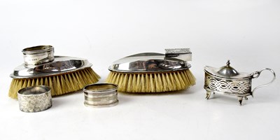 Lot 634 - Three hallmarked silver napkin rings