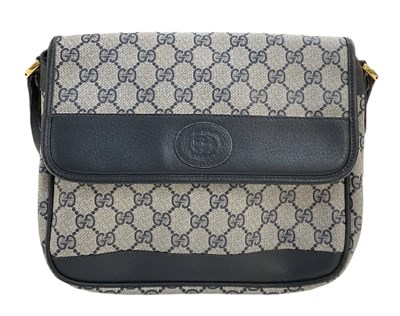 Lot 439 - GUCCI; a lady's GG monogram handbag, 22 x 27cm.