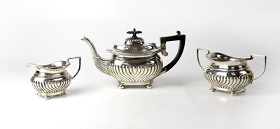 Lot 679 - An Edward VII hallmarked silver three-piece tea service