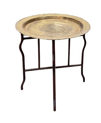 Lot 547 - A Chinese brass tray-top table, the centre...