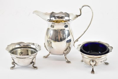 Lot 655 - A modern hallmarked silver cream jug,...