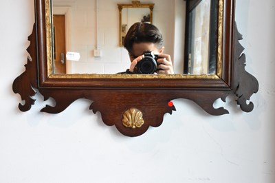 Lot 32 - A 19th century fret carved wall mirror, with...