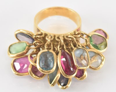 Lot 777 - A yellow metal multicoloured stone set tassel...