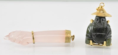 Lot 814 - A Chinese yellow metal mounted jadeite pendant...